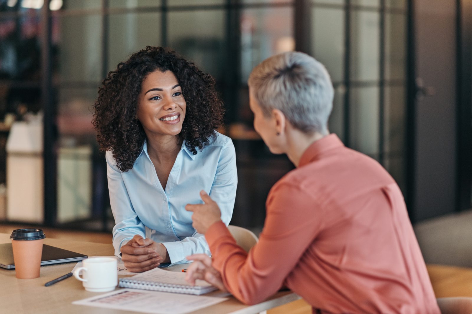 A coaching conversation between two professionals